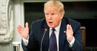 U.S. President Donald Trump speaks during a roundtable in the State Dining Room of the White House M...