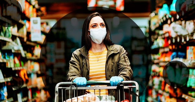 Woman pushing supermarket cart during COVID-19