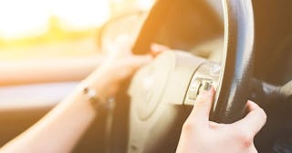 Woman driving her car