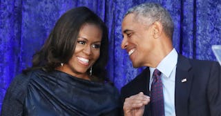 Former U.S. President Barack Obama and first lady Michelle Obama