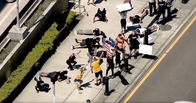 People Crowd Around Florida Courthouse Doing Squats In Protest Of Closed Gyms