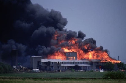 The Branch Davidians' Mount Carmel compound outside of Waco, Texas, burns to the ground during the 1...