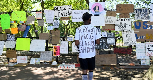 Latif Schofield spends Sunday looking at the protest signs and artwork that has been left at the fen...