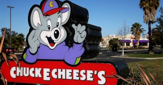 A sign is posted in front of a Chuck E. Cheese restaurant on January 16, 2014 in Newark, California.