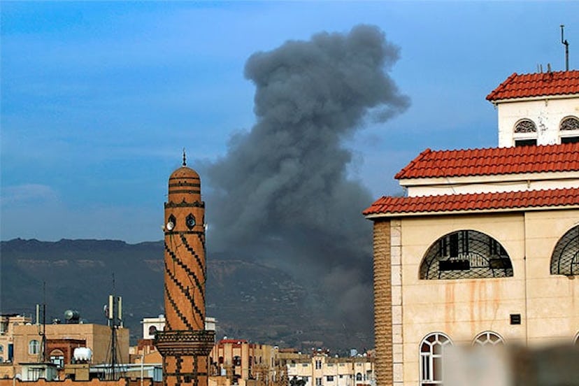 Smoke billows following an airstrike by Saudi-led coalition in the Yemeni capital Sanaa, on June 16,...