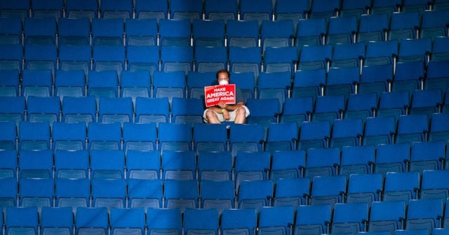 MAGA Trump supporter alone in stands