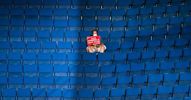 MAGA Trump supporter alone in stands