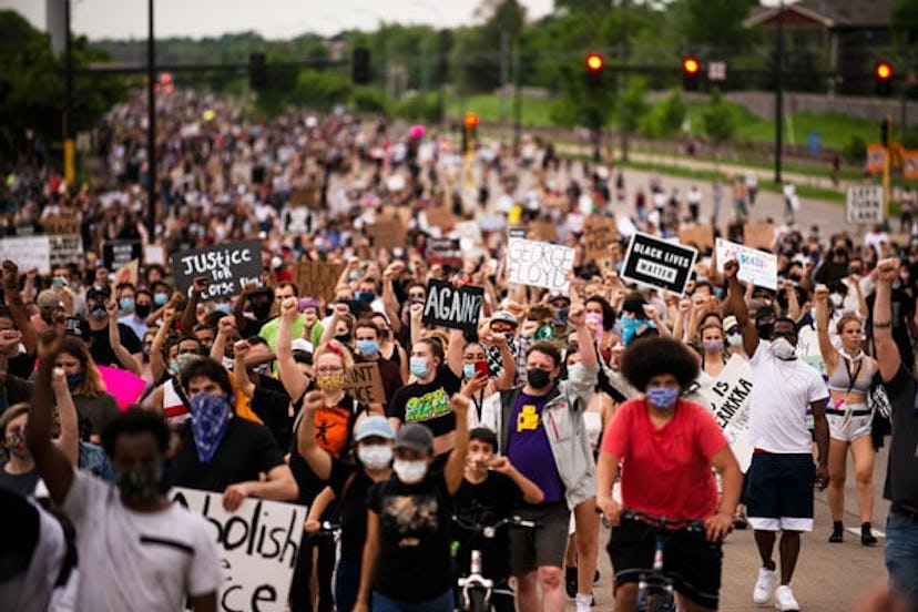 Protesters march on Hiawatha Avenue while decrying the killing of George Floyd on May 26, 2020 in Mi...