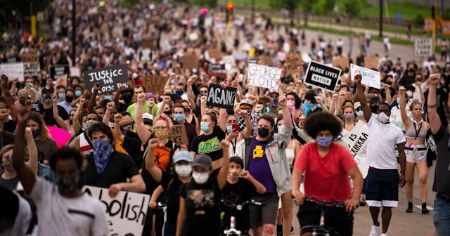 Protesters march on Hiawatha Avenue while decrying the killing of George Floyd on May 26, 2020 in Mi...