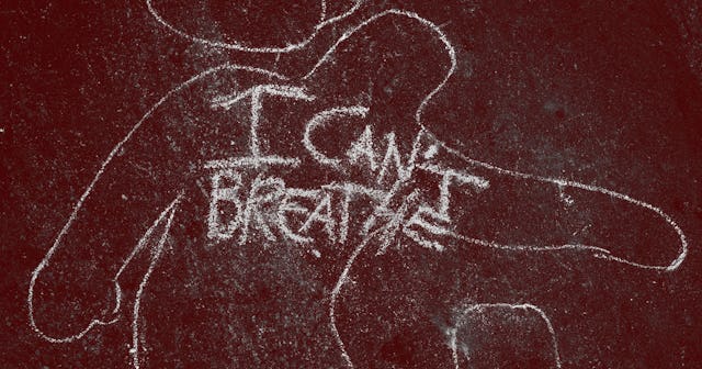 'I Can't Breathe' is scrawled on the pavement outside the District Attorney's office during a peacef...