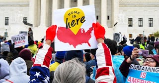 Demonstrators gather in front of the United States Supreme Court, where the Court is hearing argumen...