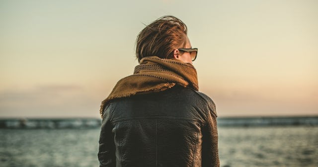 Person staring out into the sea