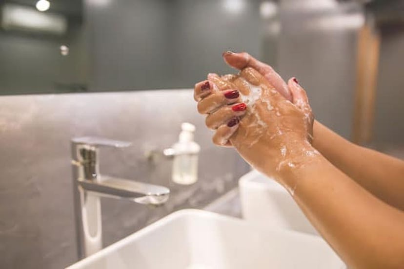 woman hand washing with soap
