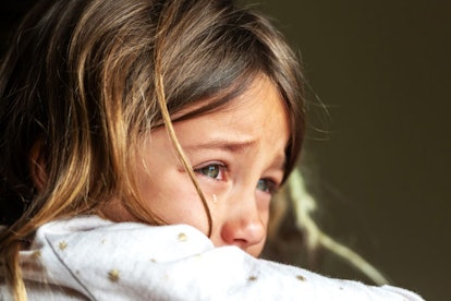 Sad crying little girl