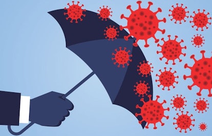 Hand holding an umbrella against the 2019 novel coronavirus