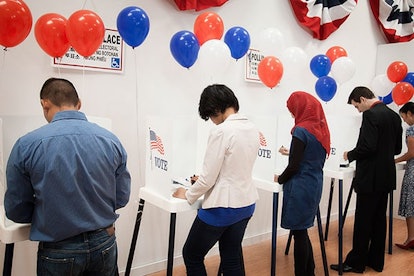 Voters voting in polling place