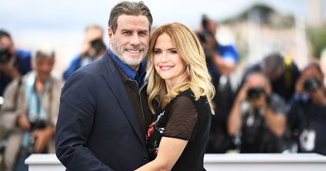 US actor John Travolta (L) and his wife US actress Kelly Preston
