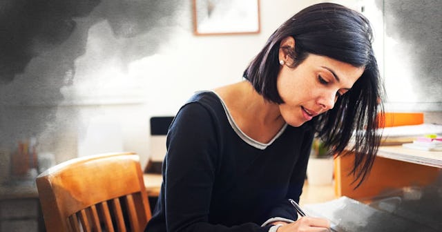 Hispanic woman working in home office