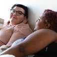 Marriage Shows You Who You Really Are: lesbian couple talking in bed