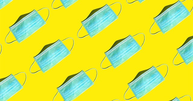 Medical surgery face masks on a bright yellow background