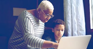 Modern ‘Productivity Culture’ Is Dictating How We Deal With The Pandemic: Mother and son studying wi...