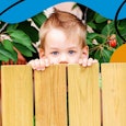 My Neighbors Are Mooching My Sitter: Child peaking over fence