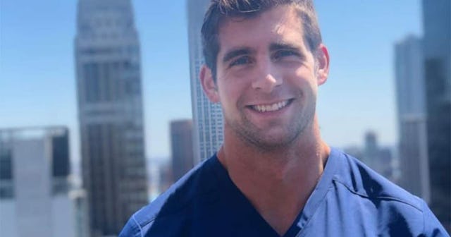 Nurse Who Left Home State To Help COVID Patients Is Battling Brain Cancer: man in scrubs smiling for...