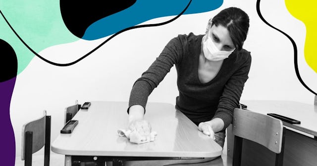 Girl in a medical mask washes tables in a school class during the quarantine period