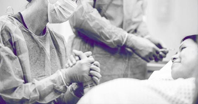 Team of doctors and nurses wear masks and gloves and prepare for surgery