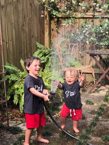 How Our Son Almost Drowned During Quarantine: boys playing with sprinkler