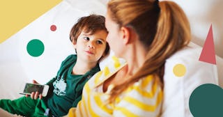 Small boy talking to his mother