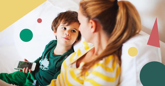 Small boy talking to his mother