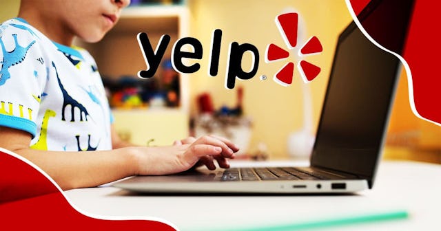 hands of a little boy on a laptop keyboard