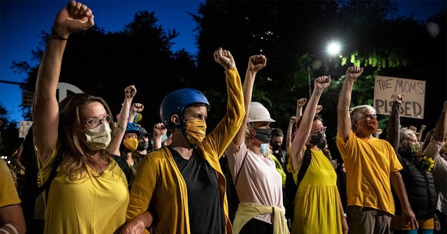 A female protester group called the Moms is seen during their nightly protest on July 20, 2020 in Po...