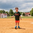 Raising Children, Not Lawns: boy on baseball field