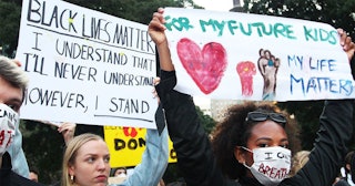 Protesters demonstrate in Hyde Park during a 'Black Lives Matter' rally on June 02, 2020 in Sydney, ...