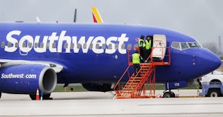 Southwest Airlines jet sits on the runway at Philadelphia International Airport after it was forced ...