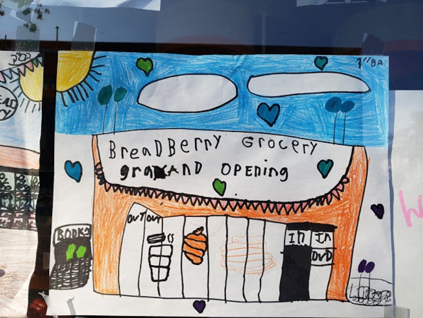 A child's drawing of the #RebuildBradbery movement picturing a Breadberry opening event
