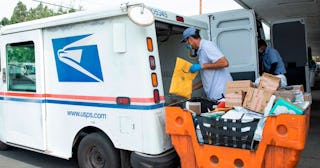 Why We Absolutely Must Save The USPS: Mail carrier Oscar Osorio continues to deliver mail in Los Fel...