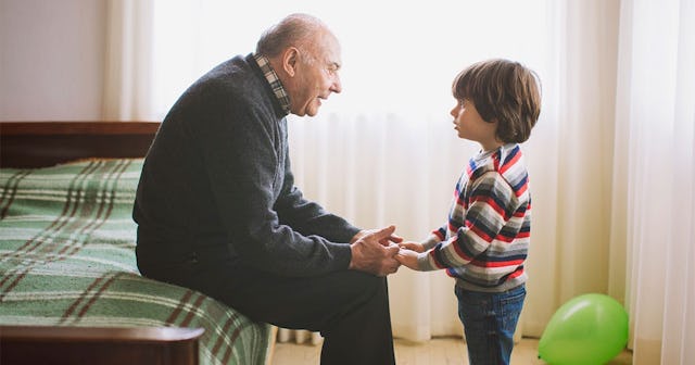 Grandfather talking to his grandson