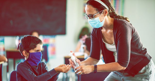 Students in the classroom are wearing protective masks during coronavirus pandemic