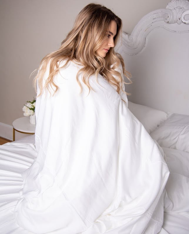 The Best Down Comforters To Keep You Warm All Fall Long