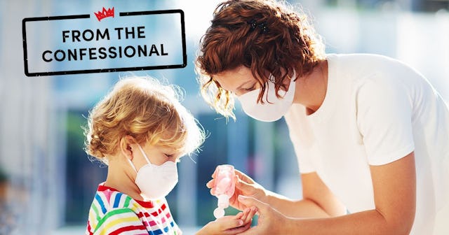 Mother and child with face mask and hand sanitizer
