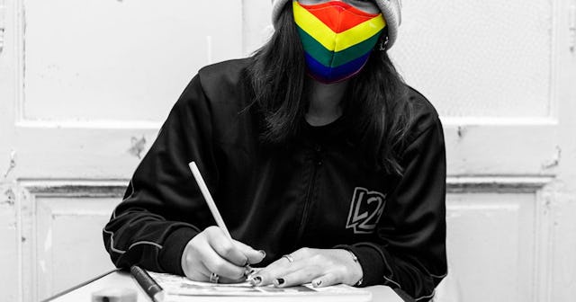 A student wearing an LGBT rainbow protective mask