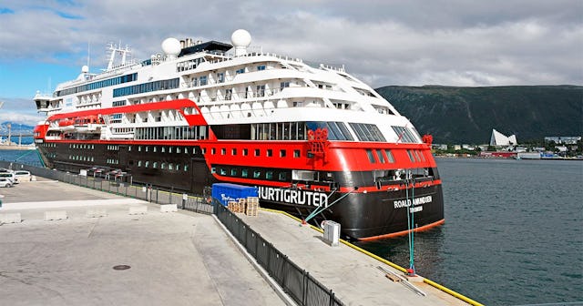 the expedition cruise ship MS Roald Amundsen is moored at a quay in Tromso, northern Norway, on Augu...