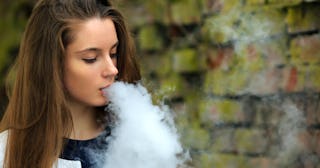 Teen girl vaping