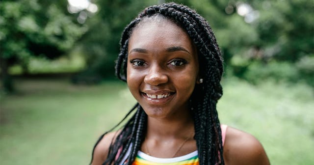 A teen girl with dreadlocks
