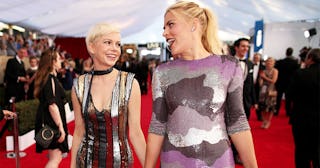 Actors Michelle Williams (L) and Busy Philipps