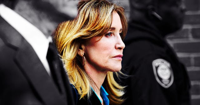 Felicity Huffman walking between a lawyer and policeman