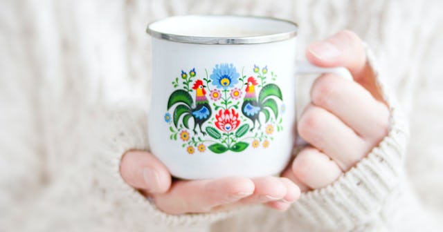 woman holding mug